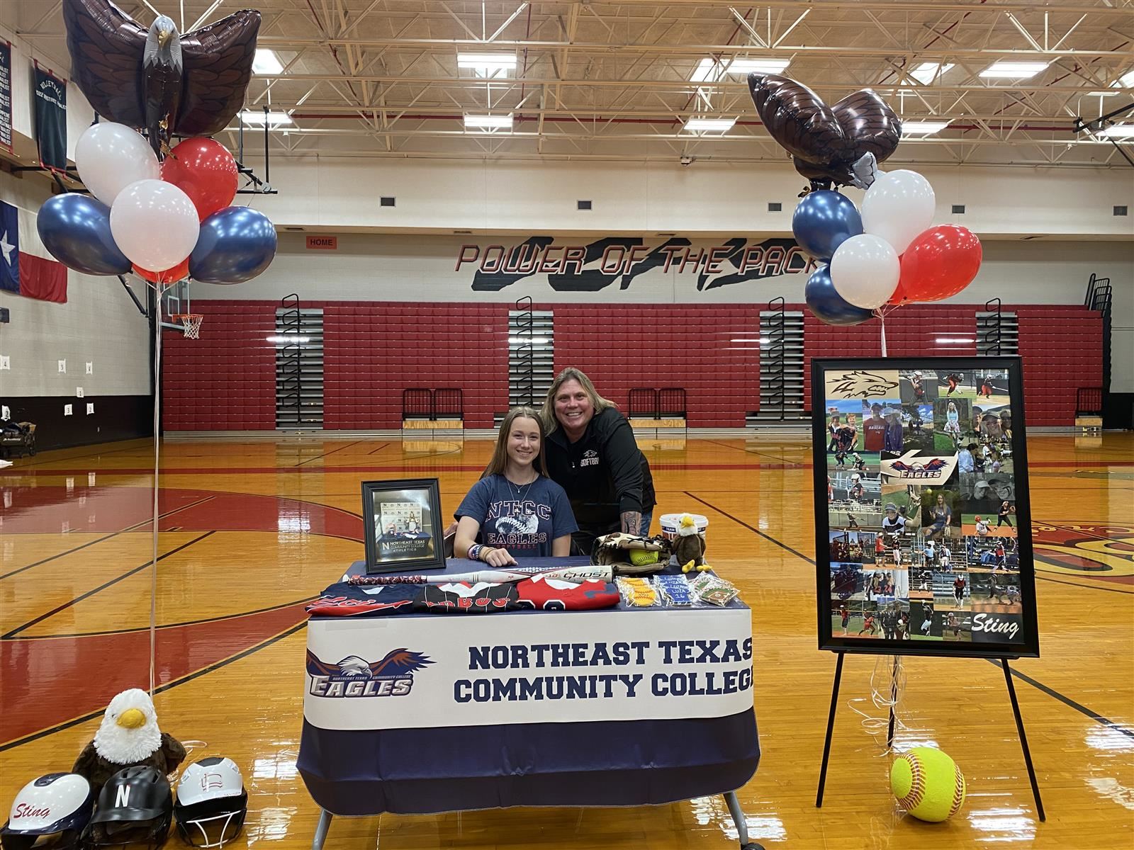 Langham Creek senior Cassidy Luza, seated, signed a letter of intent to play softball at Northeast Texas Community College.